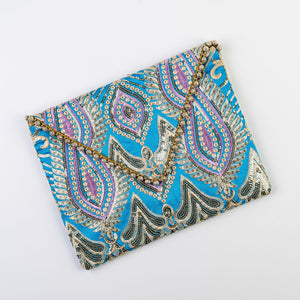 The Ibiza Clutch with Gold detail  in Turquoise