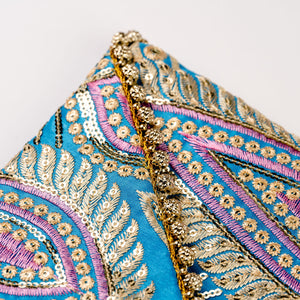 The Ibiza Clutch with Gold detail  in Turquoise
