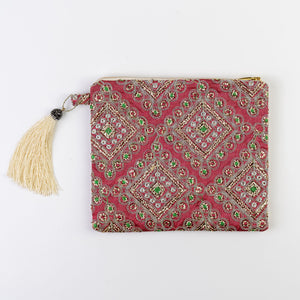 The St. Barths Tassel Clutch -Rose gold